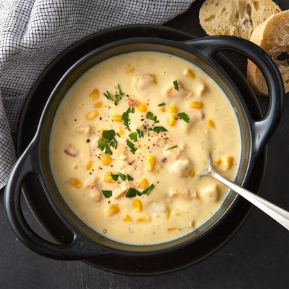 contains visible mix of corn, chicken, potatoes, celery, and onion