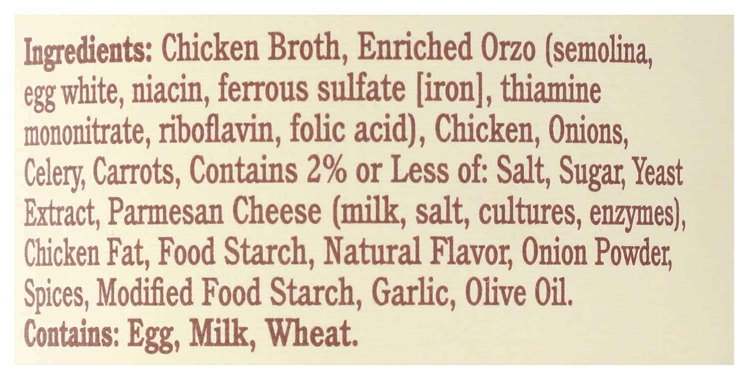 golden chicken broth base with visible chunks of real vegetables and tender chicken pieces